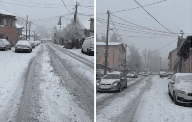 Snežna ulica u selu, zimski uvjeti, snijeg na cesti u Bosni i Hercegovini, zimski promet, snježna oluja u Balkanu.